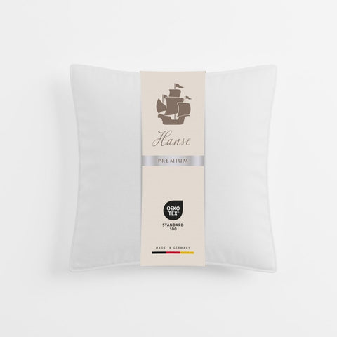 Premium 1-Kammer-Kissen Klassiker in Originalverpackung mit Qualitätslabel und eleganter Produktpräsentation.
